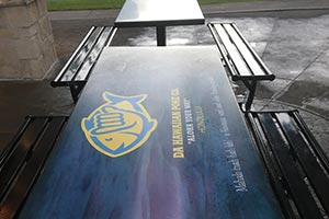 Branded Logo Artwork on Custom Restaurant Tables