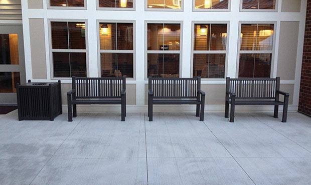 Reading benches and receptacle at senior living center