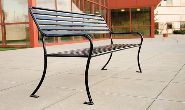 The Sienna bench graces a cultural center with its airy presence