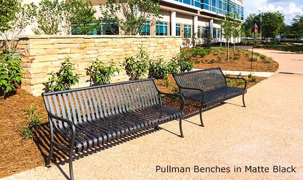 Pullman Benches with Back in Matte Black outside a healthcare facility
