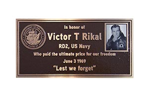 Memorial plaque with portrait photo