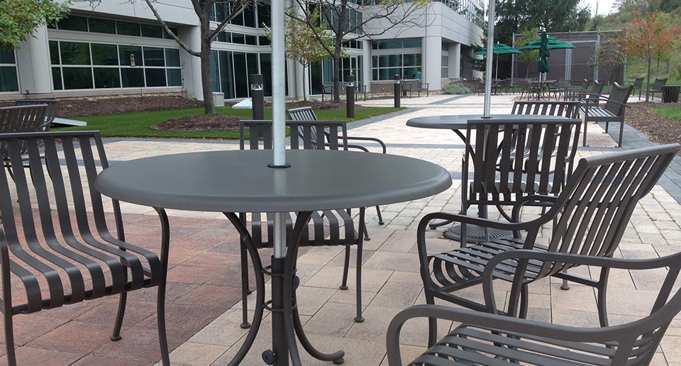 Courtyard Table Set and Exeter Benches with Back on a corporate campus