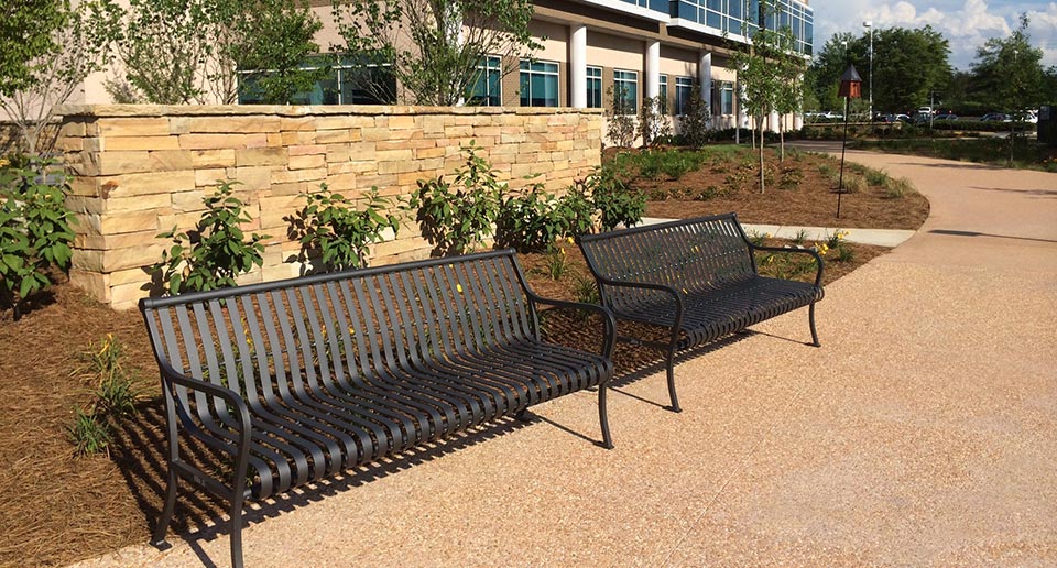 Pullman Benches with Back at the entrance to an office building
