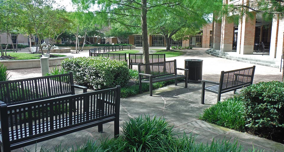 Reading Benches and Litter Receptacles in a college courtyard environment