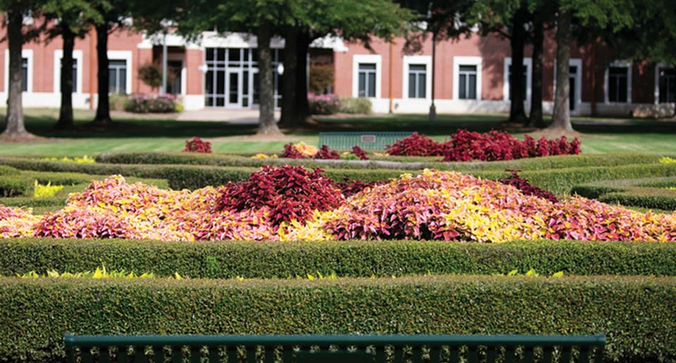 Pullman Benches in a beautiful garden setting on campus