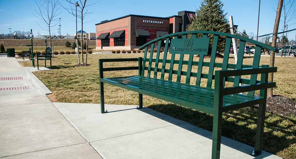 Branded McConnell Bench with Back at outdoor shopping complex