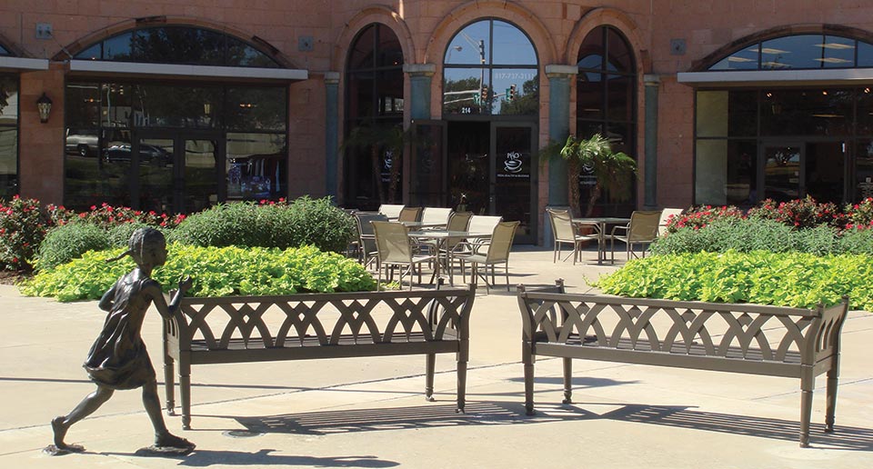 Matching Augustine Benches with Back outside an open air restaurant